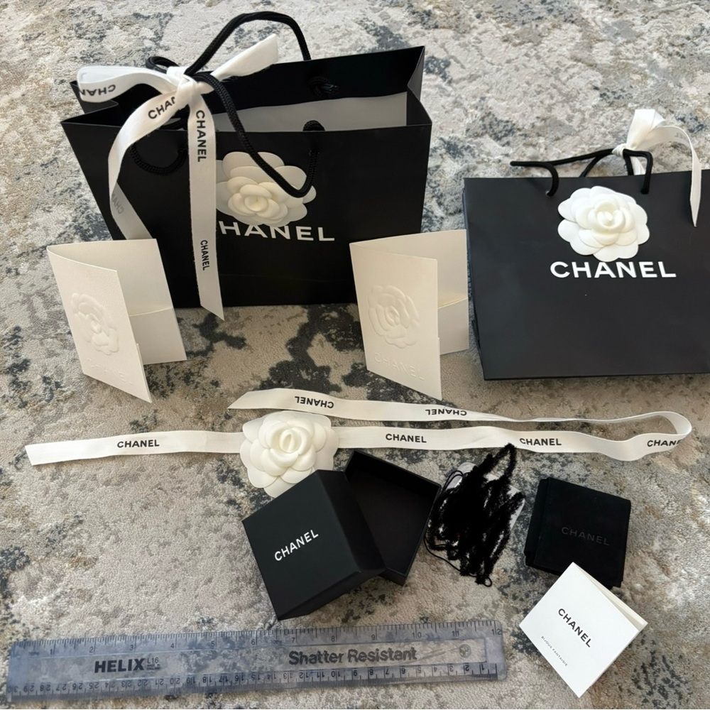 One authentic Chanel Earrings box with velvet case, 2 Chanel shopping bags